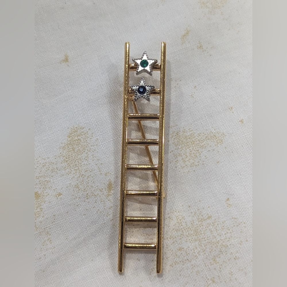 Unique Jacobs ladder gold pin with two stars to represent Angels with gemstones.